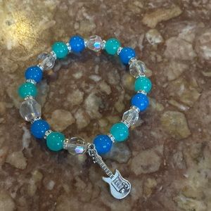 Handmade stretch rock n roll theme bracelet